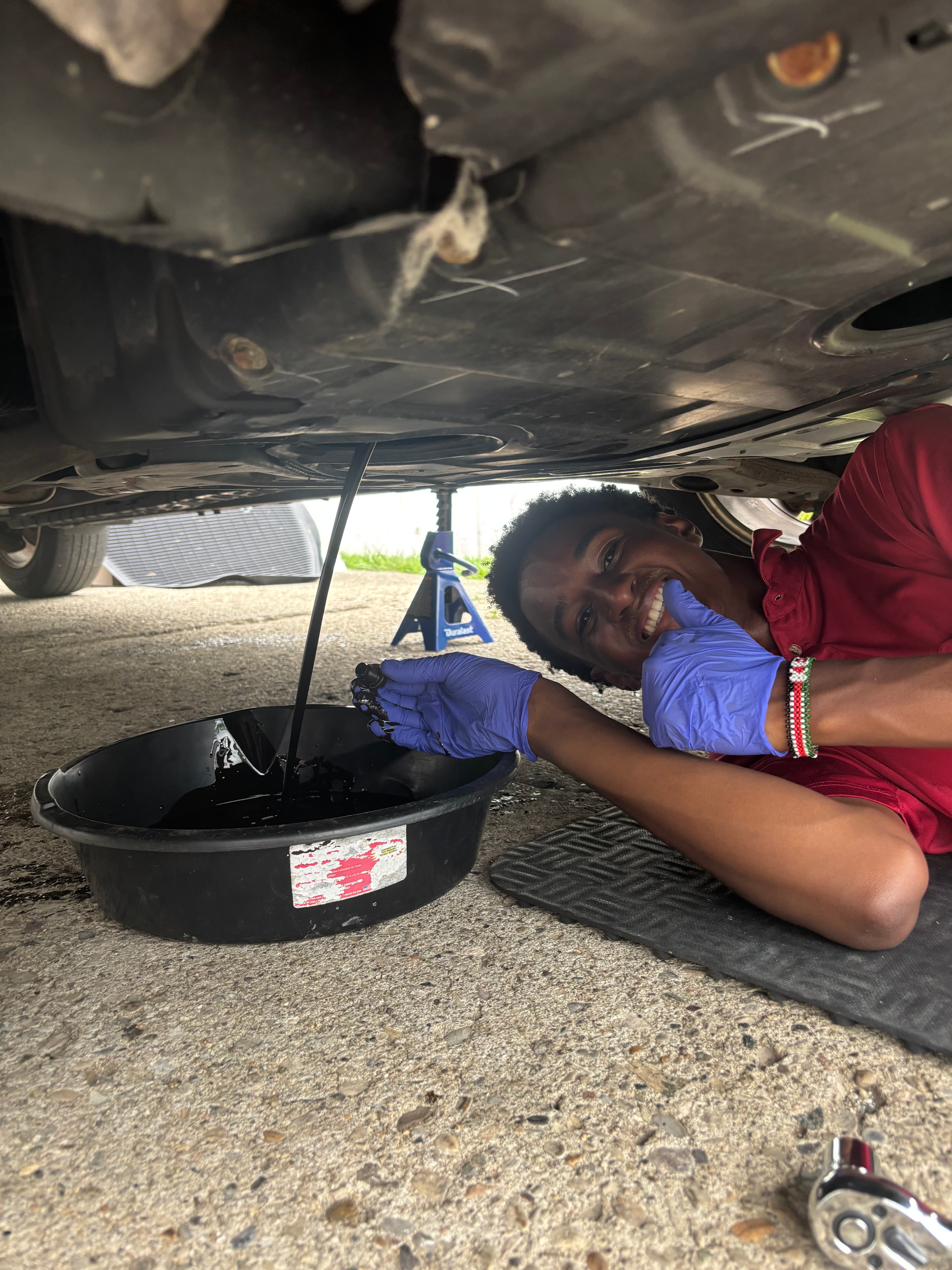Wesley doing an oil change